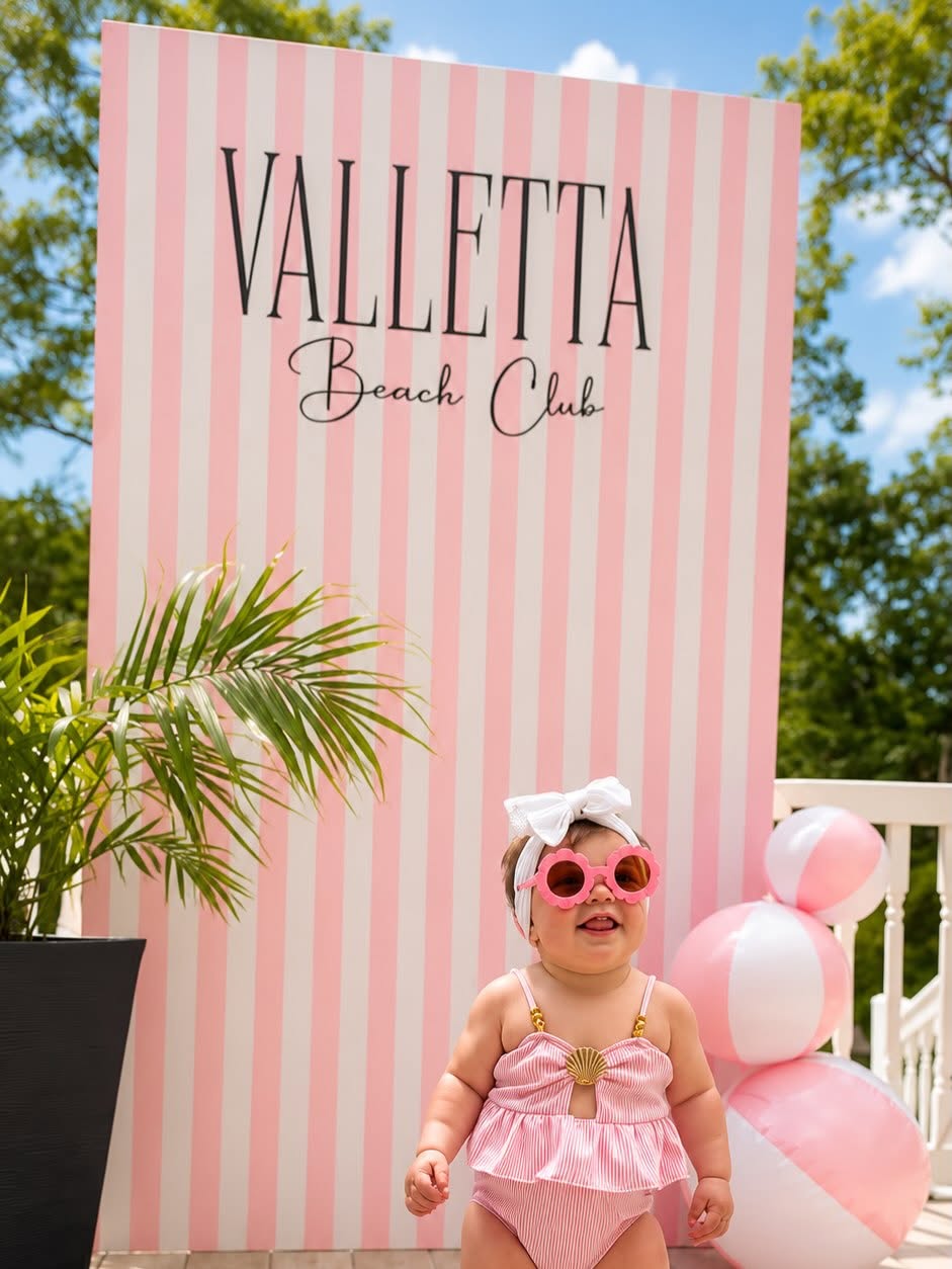 Pink striped Valletta Beach Club custom party backdrop